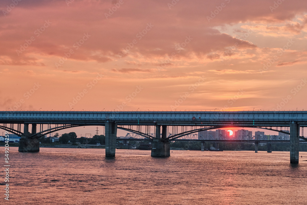 Bridges over Ob river on sunset in Novosibirsk, Russia.