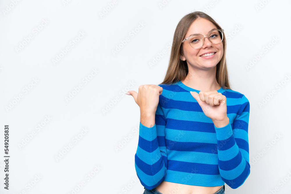 Young beautiful blonde woman isolated on white background pointing to the side to present a product Young beautiful blonde woman isolated on white background pointing to the side to present a product