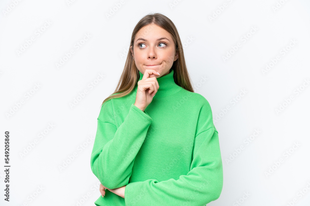 Young beautiful blonde woman isolated on white background having doubts and thinking Young beautiful blonde woman isolated on white background having doubts and thinking