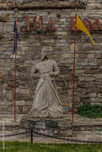 Vertical shot of statue of Taras Bulba in Kamianets-Podilskyi, Ukraine photo