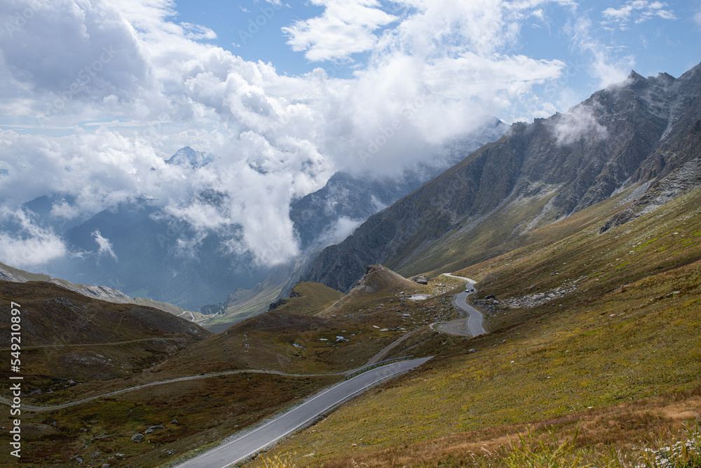 road to the Colle dell Agnello or Col Agnel mountain pass in the Alps located on the border between Italy and France road to the Colle dell Agnello or Col Agnel mountain pass in the Alps located on the border between Italy and France