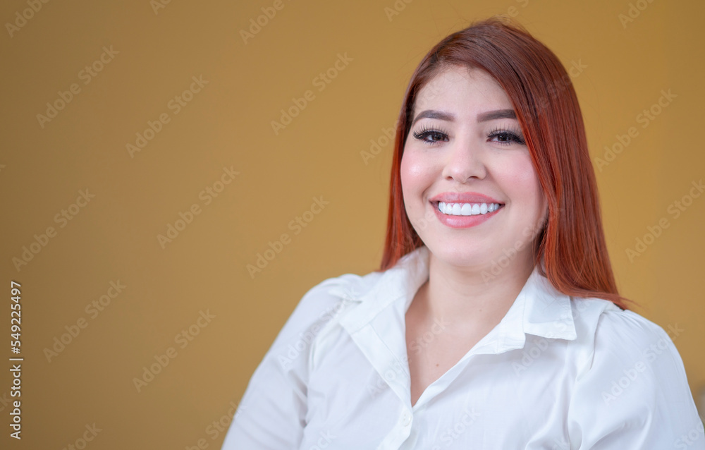 happy woman, enjoying a mustard yellow background, a beautiful smile and a white shirt happy woman, enjoying a mustard yellow background, a beautiful smile and a white shirt