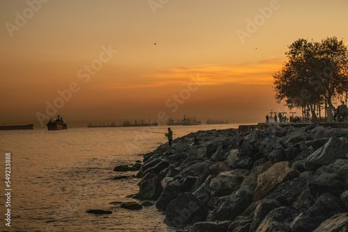 Lone fisherman during the sunset in Istanbul 