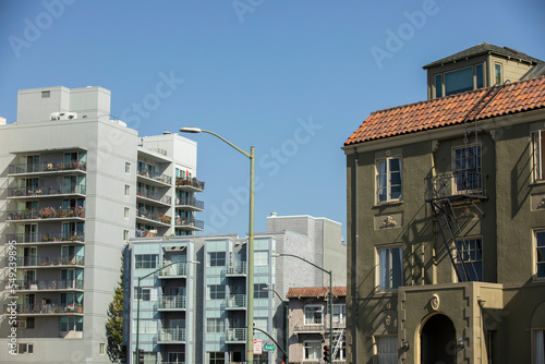 Afternoon view of dense housing buildings in downtown Oakland, California, USA.