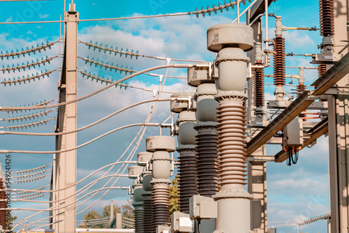 Obraz na płótnie Current and voltage converter for an electrical substation. Dielectric insulator close-up. Transformation and transmission of electricity from generator to consumers w salonie