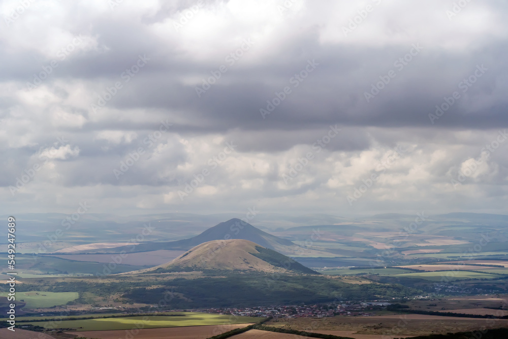 View of city of Pyatigorsk from top of Mount Mashuk. Panoramic view from Mount Mashuk to Mount Lysuya and surrounding landscape.