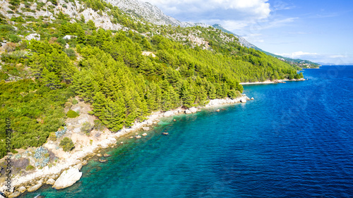 Makarska. Tourist city of Makarska aerial view of beaches and Biokovo mountain, Dalmatia archipelago of Croatia