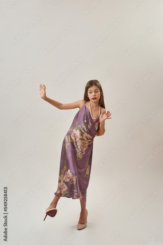 Elegant cute caucasian little girl looking away Elegant cute caucasian little girl looking away