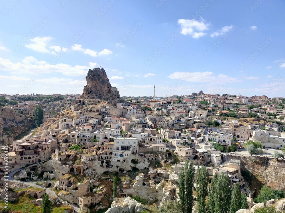 A photograph of the city of Ortahisar at daytime with Clear Blue Skies