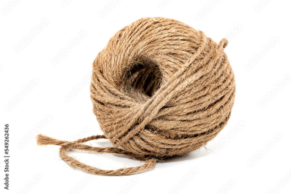 A ball of rope on a white background close-up. Harness. Jute. Twine isolate A ball of rope on a white background close-up. Harness. Jute. Twine isolate