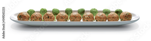 Ready to cook meatballs on white tray. photo