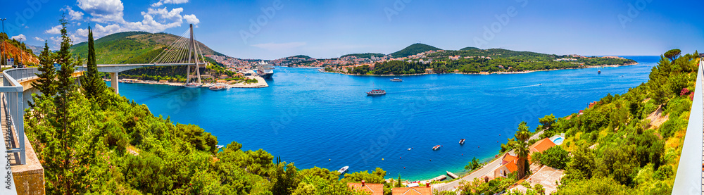 Coastal summer landscape - view of Dubrovnik from the side of The Franjo Tudman Bridge, overlooking the port of Gruz and the Lapad peninsula on the Adriatic coast of Croatia