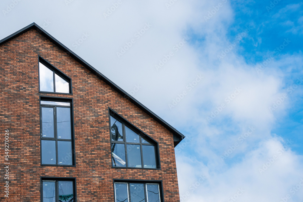 A beautiful brick building with large windows