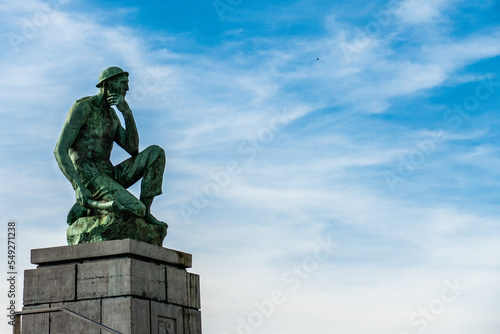 Charleroi, Belgium, November 11, 2022. The Crouching Miner located is a monument dedicated to Labor, designed by Constantin Meunier.