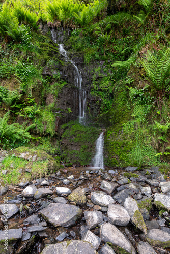 Long exposure of the Hollowbrook waterfall on the South West coastpath in Exmoor National Park photo