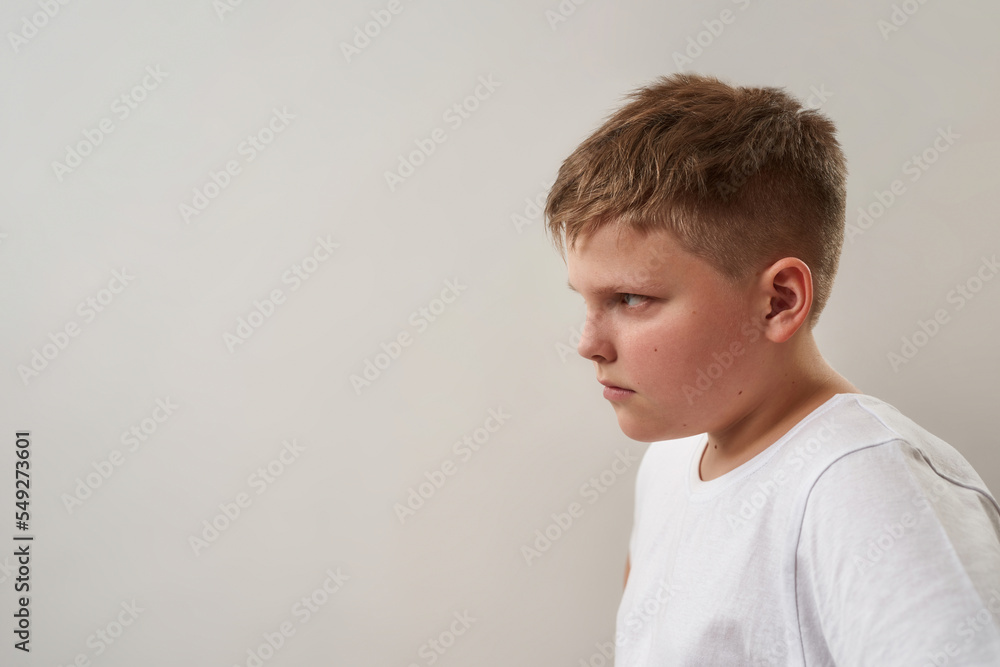 Partial side view of focused boy looking away Partial side view of focused boy looking away