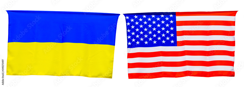 Obraz premium Ukrainian and American flags hanging on a wall
