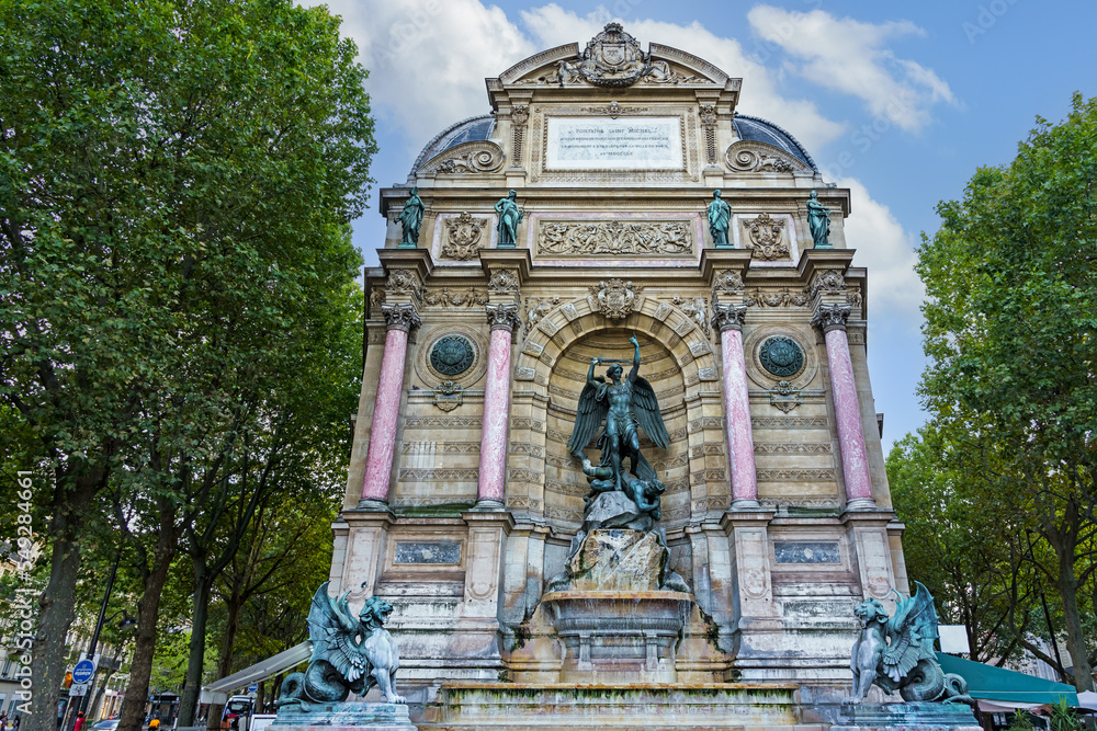 Fototapeta premium The Fontaine Saint-Michel, historical monument in Paris, France, constructed in 1858–1860.