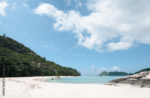 Beautiful tropical beach with crystal blue waters at Seychelles