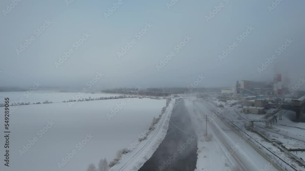 foggy dawn near the plant, Russia Urals foggy dawn near the plant, Russia Urals