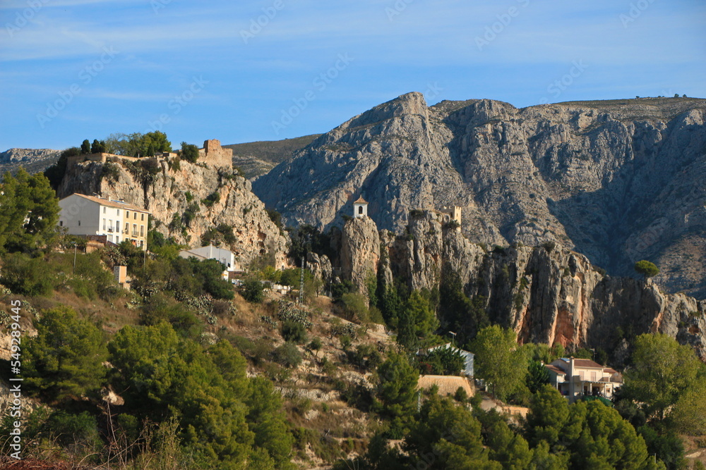 Guadalest castle on the topmost part of the cliff with castle buildings