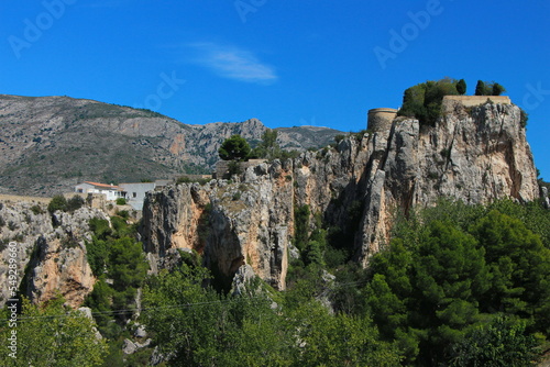Fototapeta Naklejka Na Ścianę i Meble -  Guadalest castle on the topmost part of the cliff with castle buildings