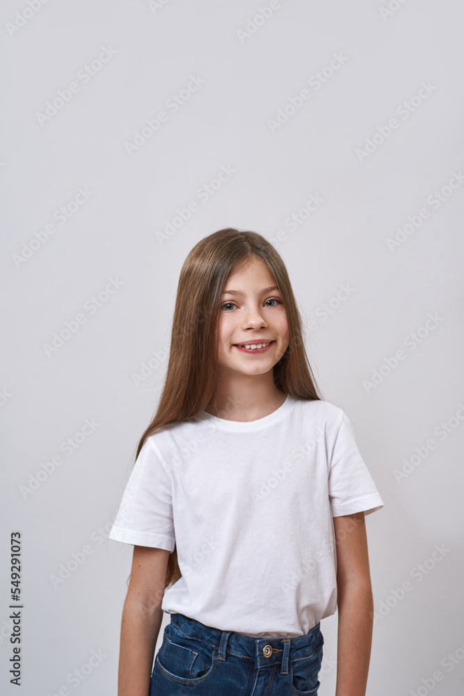 Cute smiling caucasian little girl look at camera Cute smiling caucasian little girl look at camera