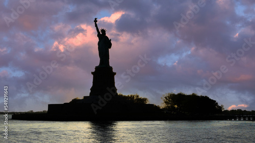 New York united states 21, may 2018 sunset at the statue of liberty