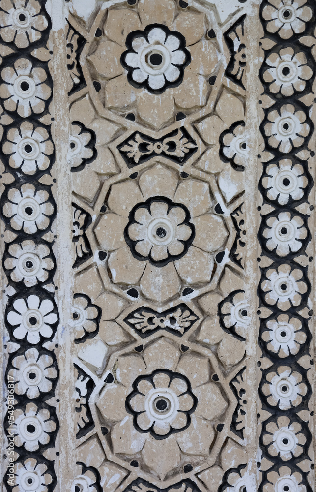 Carved exterior wall of historic Qutb Shahi tombs at , Hyderabad, India.