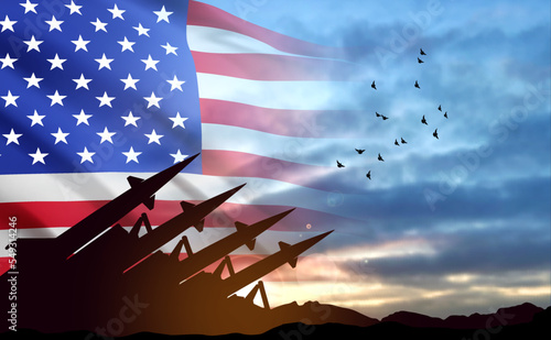 Strategic missiles concept on USA flag at the sky at sunset. Missile defense