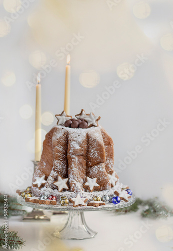 Traditional Italian Christmas cake Panettone Pandoro. Christmas decorations. Traditional Italian Christmas cake Panettone Pandoro. Christmas decorations. Bokhe. copy space