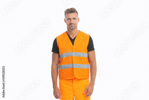 cheerful builder supervisor man in orange uniform. builder man wearing working reflective vest.