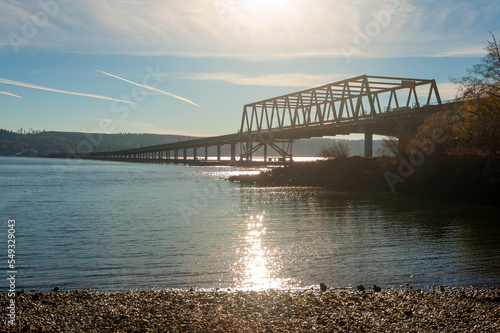 Hood Canal Bridge is a floating bridge in the northwest United States, located in western Washington state. It connects the Olympic and Kitsap Peninsulas. Third longest floating bridge in the world.  photo