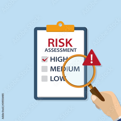 Risk assessment or identification analysis with hand hold magnifier and exclamation mark