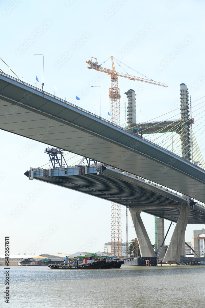 Suspension bridge under construction.  The bridge cross over Chao Phraya River in Bangkok Thailand.