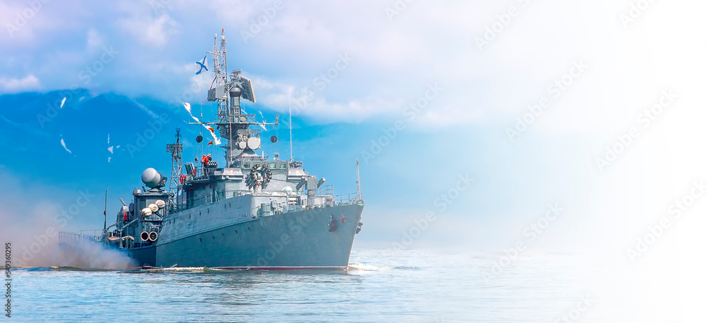 Russian warship going along the coast. Selective focus