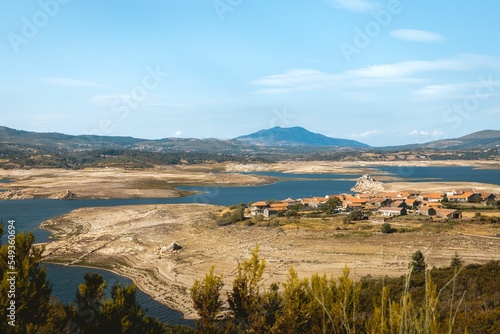 Landscape of Vilarinho de Negroes island with seascape beach around with blue sky in Portugal photo