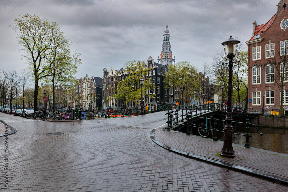 Obraz premium Downtown Amsterdam city skyline. Cityscape in Netherlands at sunset
