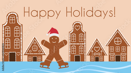 Gingerbread man in Santa's hat on skating rink against gingerbread houses