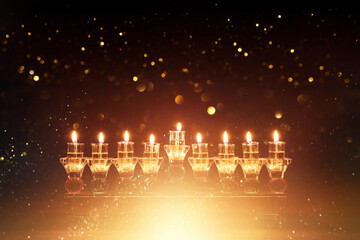 Image of jewish holiday Hanukkah with menorah (traditional candelabra) and candles