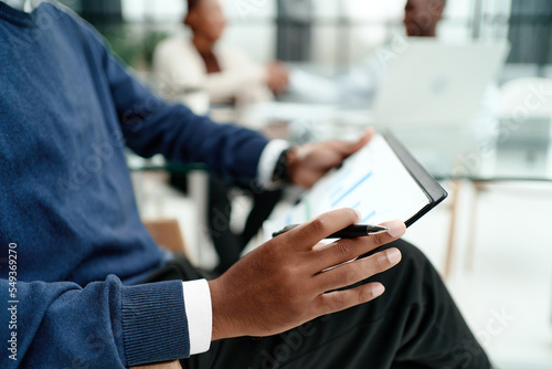 business man analyzing a financial document . close-up.