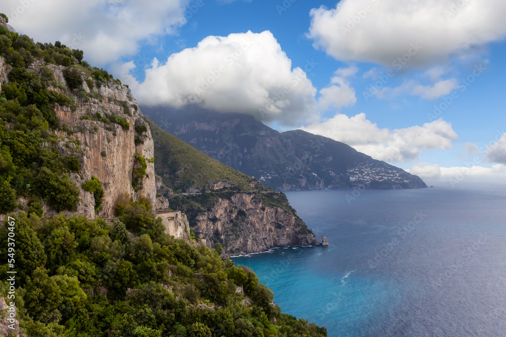 Rocky Cliffs and Mountain Landscape by the Tyrrhenian Sea. Amalfi Coast, Italy. Nature Background. Cloudy Sky Art Render