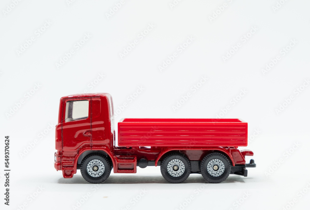 Red truck on white background with copy space