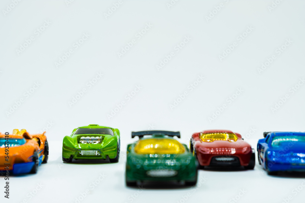 Fast car toys on white background with copy space Fast car toys on white background with copy space