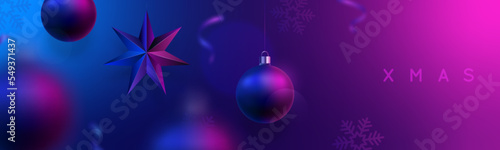 Xmas adversting banner. Hanging Christmas balls with colorful reflection. Festive neon composition. photo
