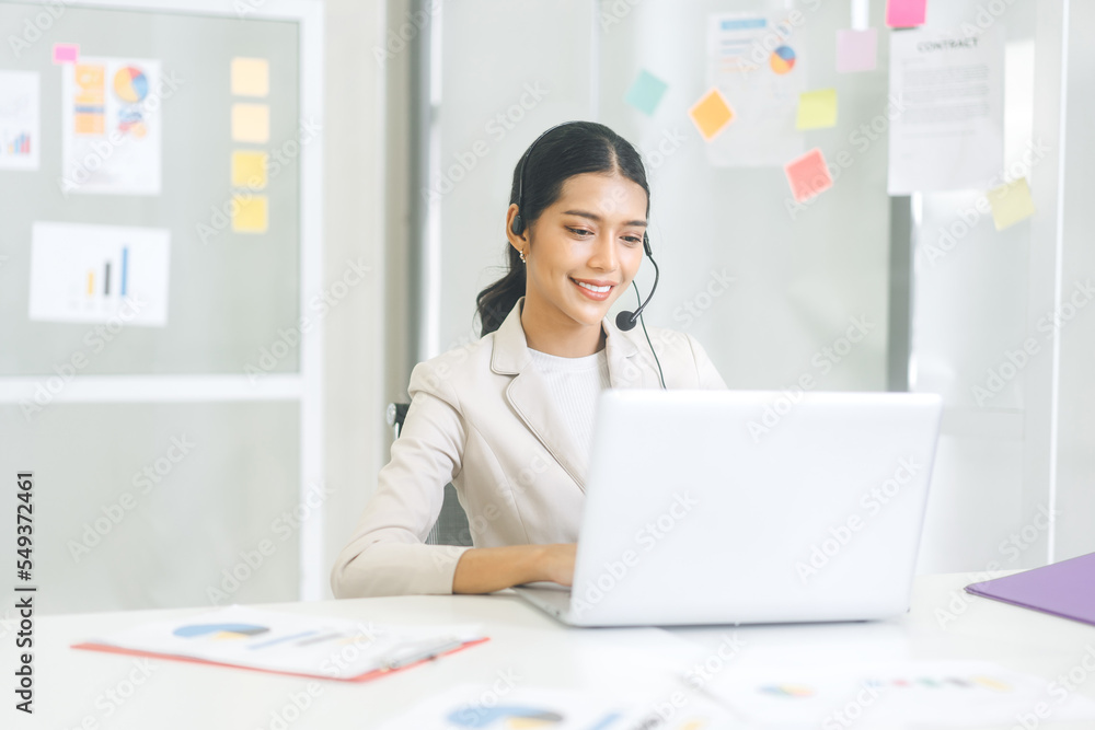 Portrait of young adult southeast call center department business asian entrepreneur woman wearing white suit Portrait of young adult southeast call center department business asian entrepreneur woman wearing white suit