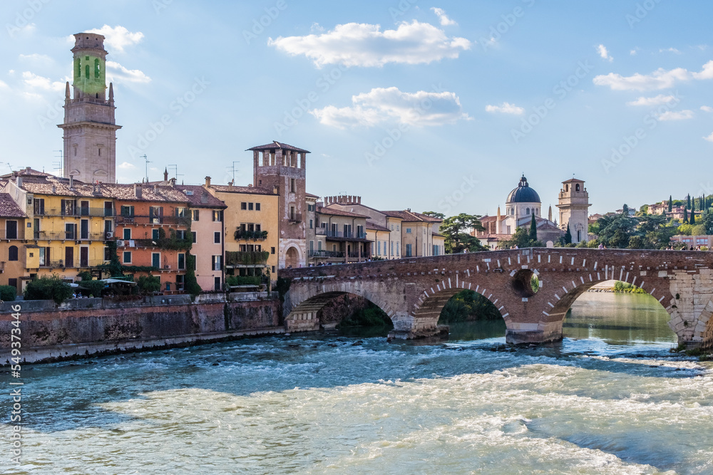 Fototapeta premium Bridge over the Verona river with ancient town in the background
