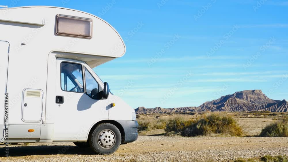 Motorhome in the desert- Bardenas Reales desert in Spain Motorhome in the desert- Bardenas Reales desert in Spain