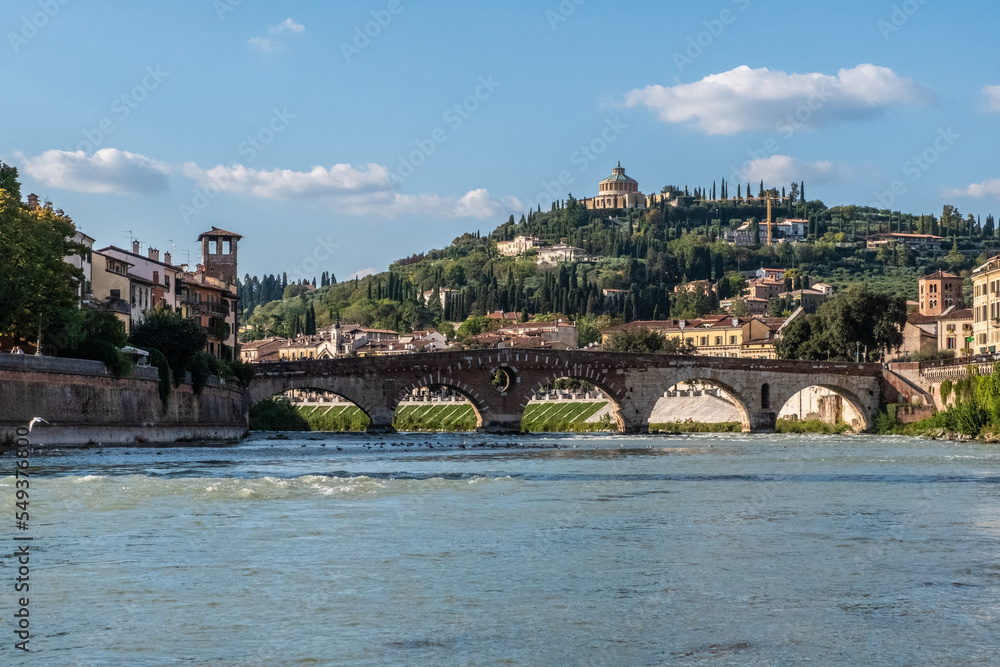 Hills of Verona with lake and bridge in the foreground