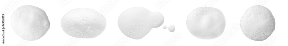Set with drops of fluffy soap foam on white background, top view. Banner design - obrazy, fototapety, plakaty 